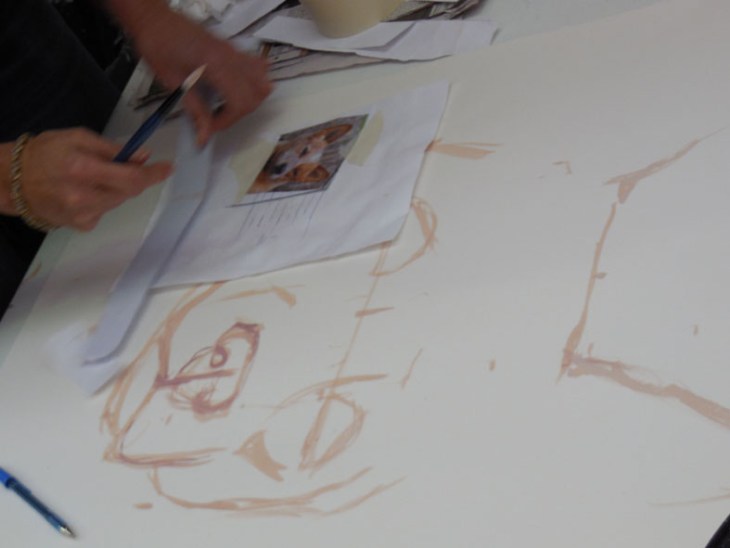 Source material and the full sized sheet with key features sketch-painted in.